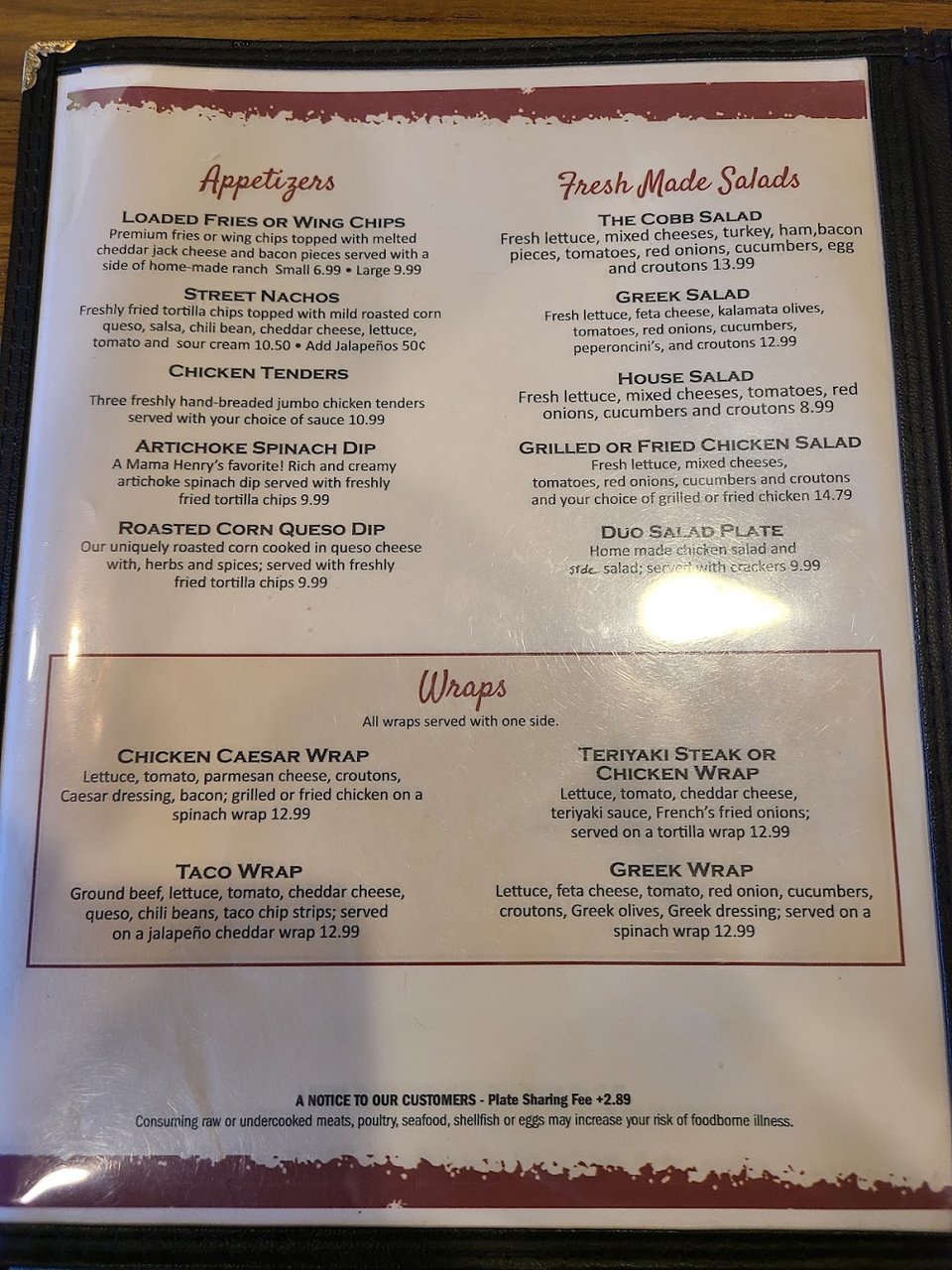 Menu board listing ice cream flavors and savory favorites.